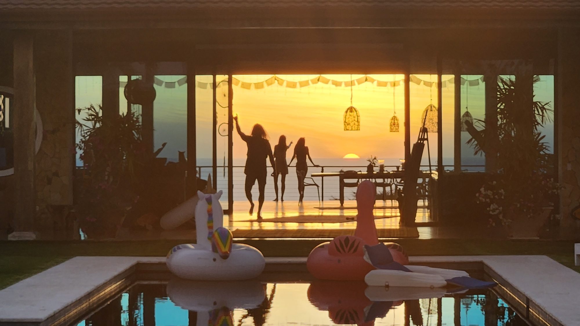 Guests at sunset at the villa
